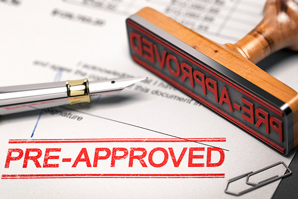Image of a pre-approved mortgage document, symbolizing smart credit-building strategies